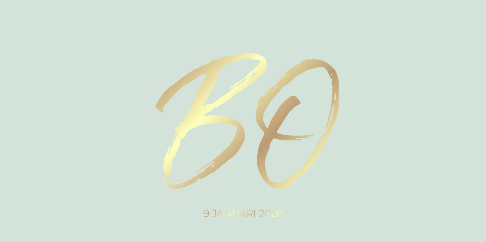 Stevig geboortekaartje van munt groen papier en goudfolie